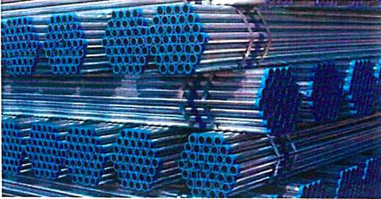 Stacked galvanised iron pipes